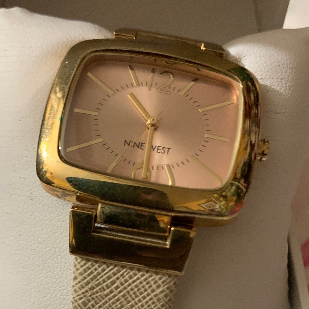 Nine West Gold Tone Bracelet Watch with Pink Dial I tested. Needs battery